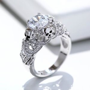 Sterling Silver Four Skulls Round Diamond Ring